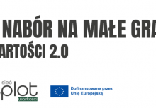 biały plakat z zielonymi elementami
