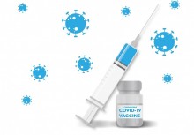 Na grafice na pierwszym planie strzykawka i pojemnik z napisem: coronavirus covid-19 vaccine